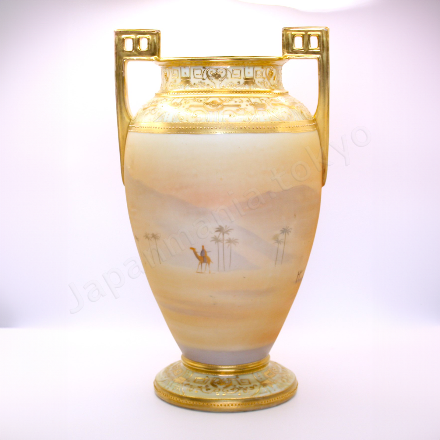 Back view: Japanese old fine china. Old Noritake. Vase with handles
Men on camel landscape design
polychrome and gold