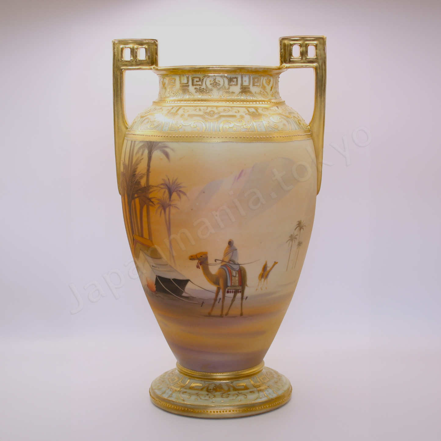 Front view: Japanese old fine china. Old Noritake. Vase with handles
Men on camel landscape design
polychrome and gold