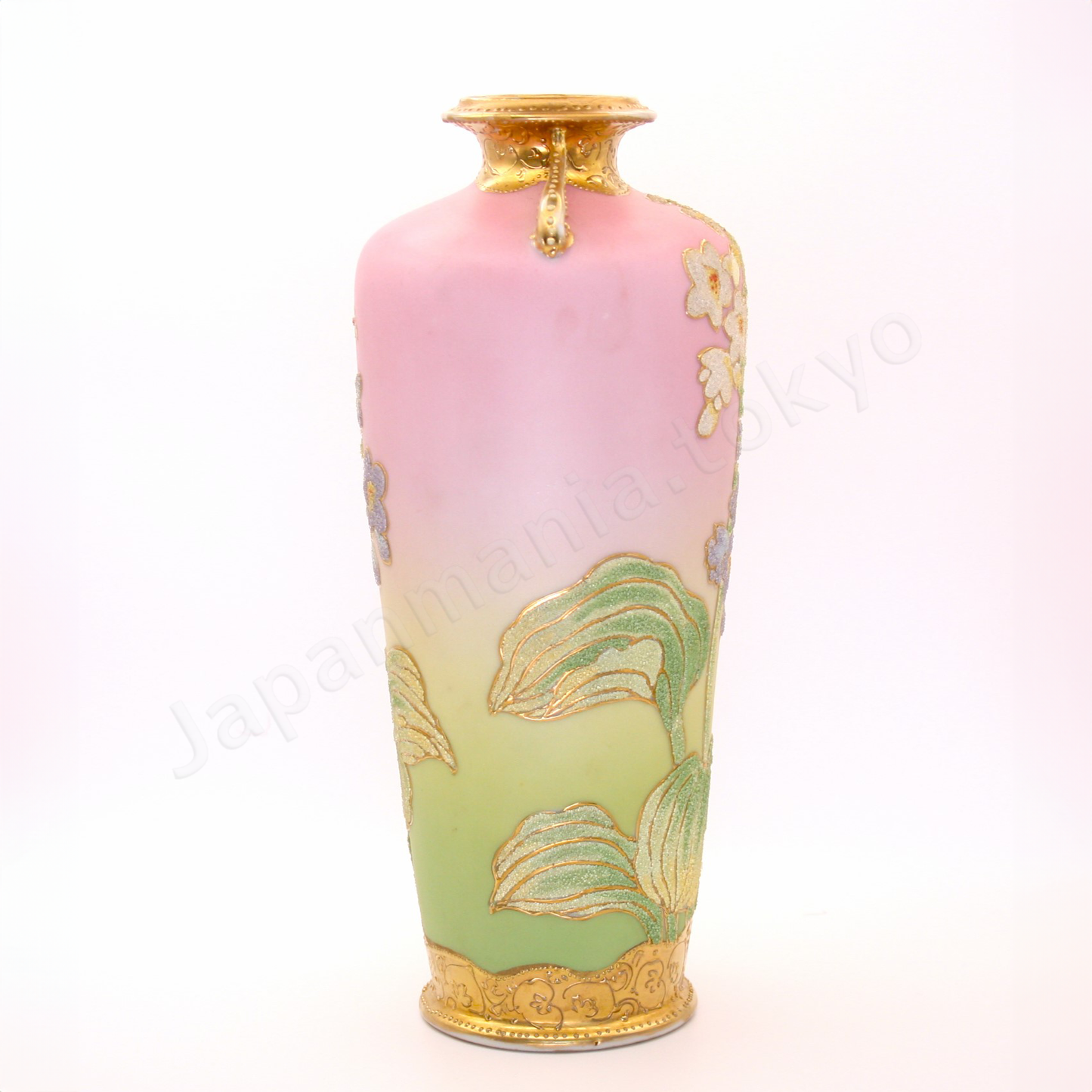 Side view: The Old Noritake CL-3 Vase, featuring a floral design with polychrome colors, delicate gold accents on the top and bottom, and beautiful coralene bead details. The background fades softly from pink at the top to cream and light green towards the base.