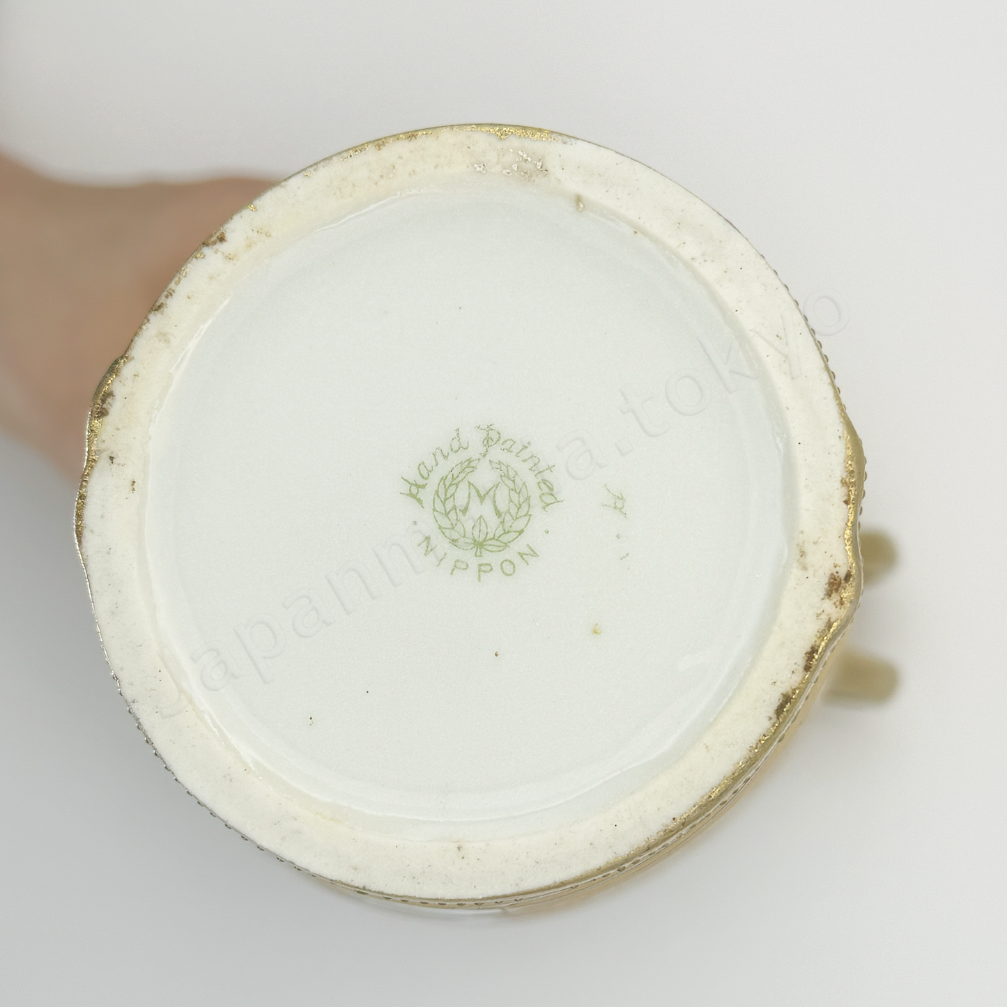 Back stamps: Patent Mark.
The Old Noritake CL-3 Vase, featuring a floral design with polychrome colors, delicate gold accents on the top and bottom, and beautiful coralene bead details. The background fades softly from pink at the top to cream and light green towards the base.