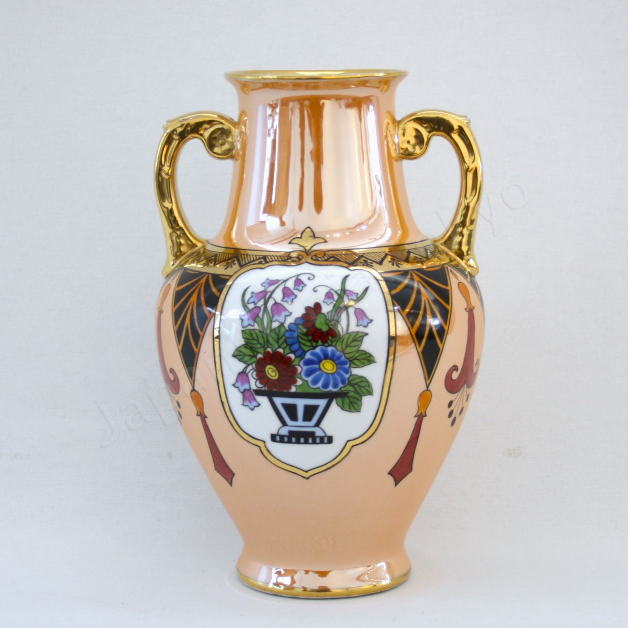 Front view The Old Noritake EB-1124 Vase, showcasing its elegant Art Deco style with a flower basket design and a shimmering polychrome luster finish.