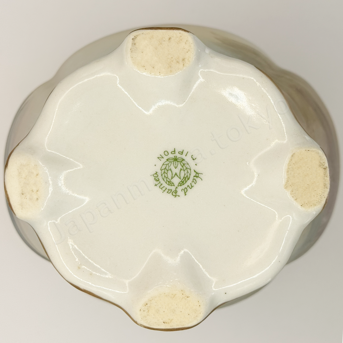 Back stamps: M in Wreath
Japanese old fine china. Old Noritake.
Ruffle top vase with handles
Landscape design
Polychrome