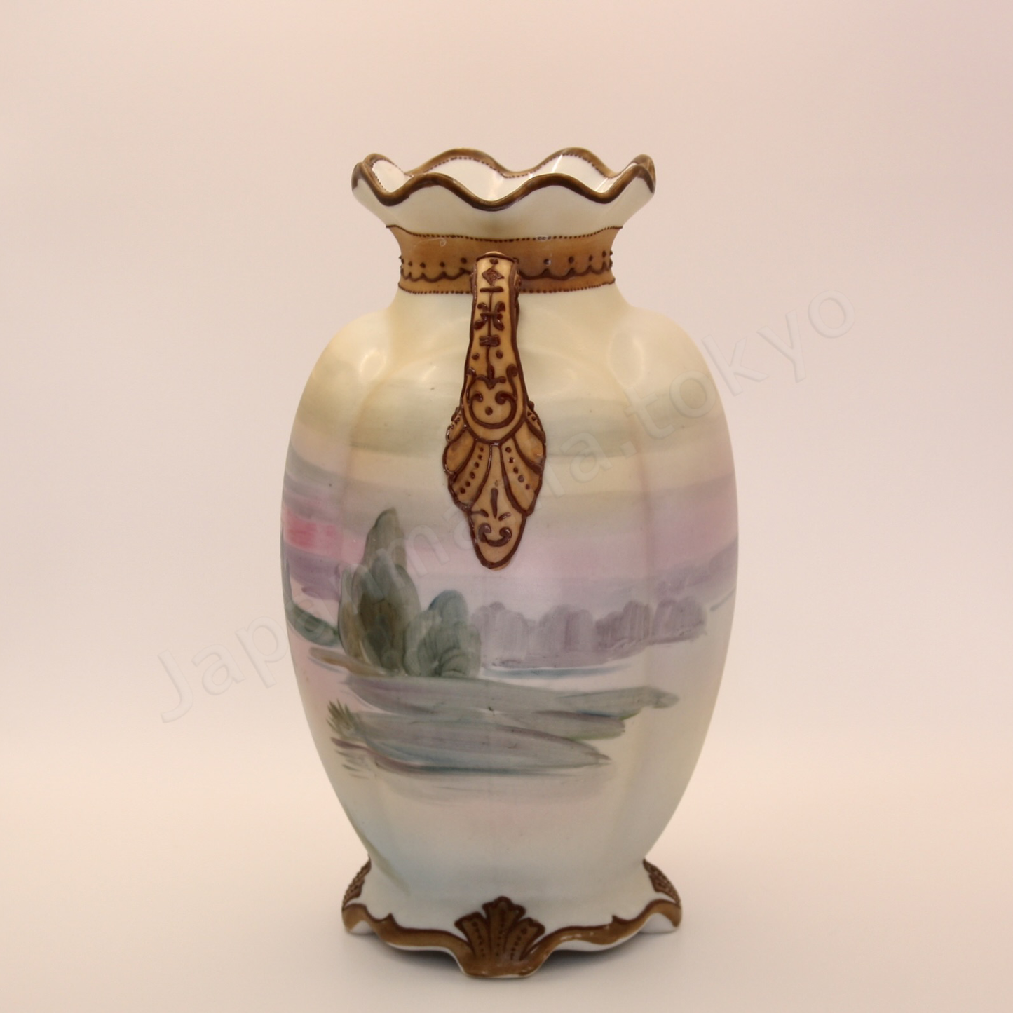 Side view: Japanese old fine china. Old Noritake.
Ruffle top vase with handles
Landscape design
Polychrome