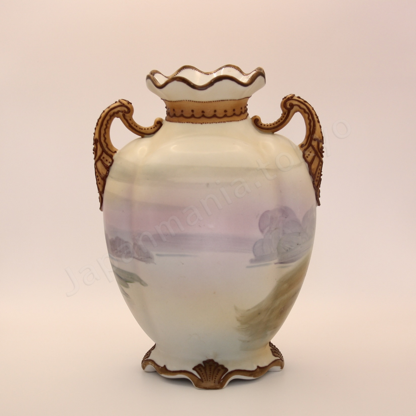 Back view: Japanese old fine china. Old Noritake.
Ruffle top vase with handles
Landscape design
Polychrome