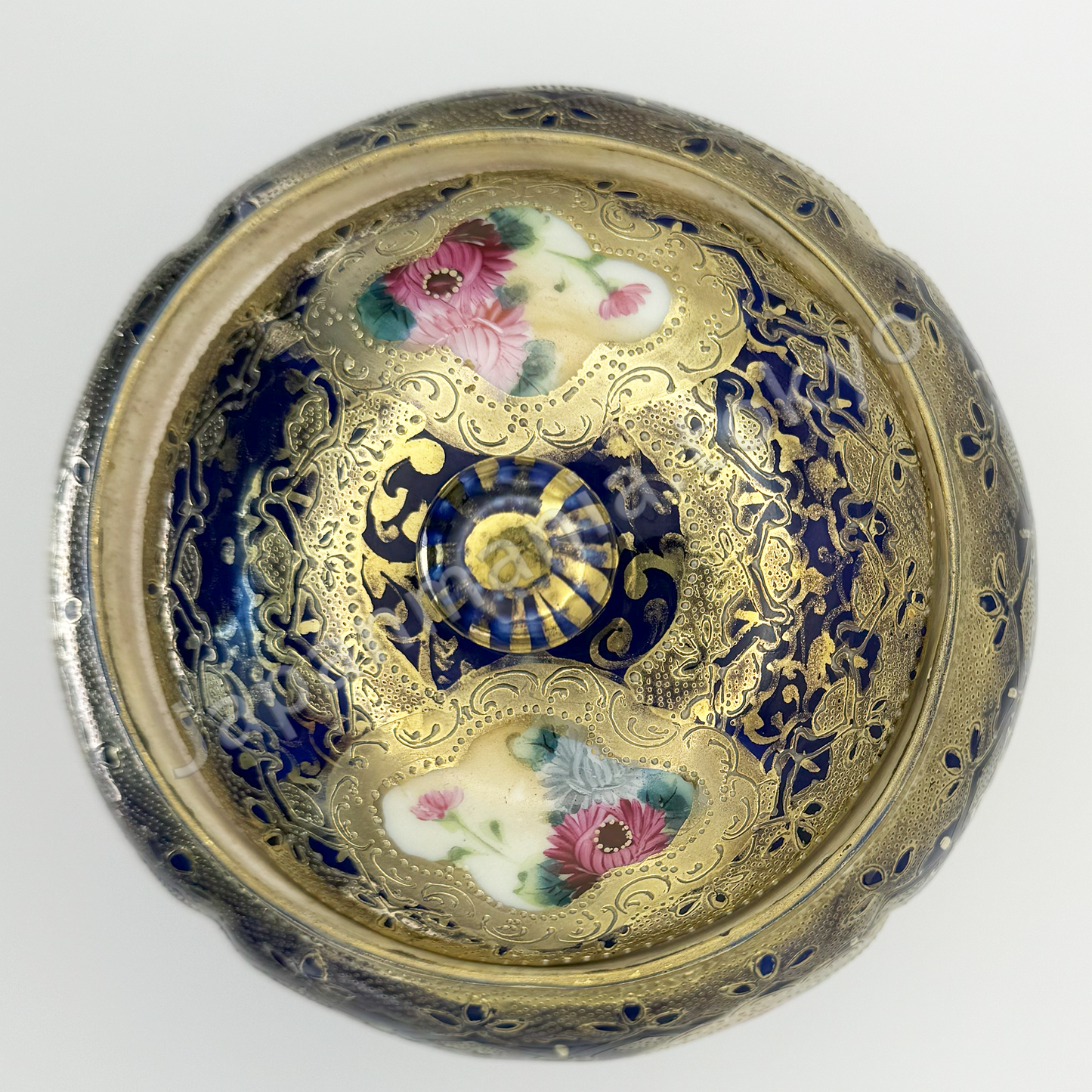 Top view: Japanese old fine china. Old Noritake.
Footed cookie jar with Chrysanthemum design
cobalt blue and gold relief