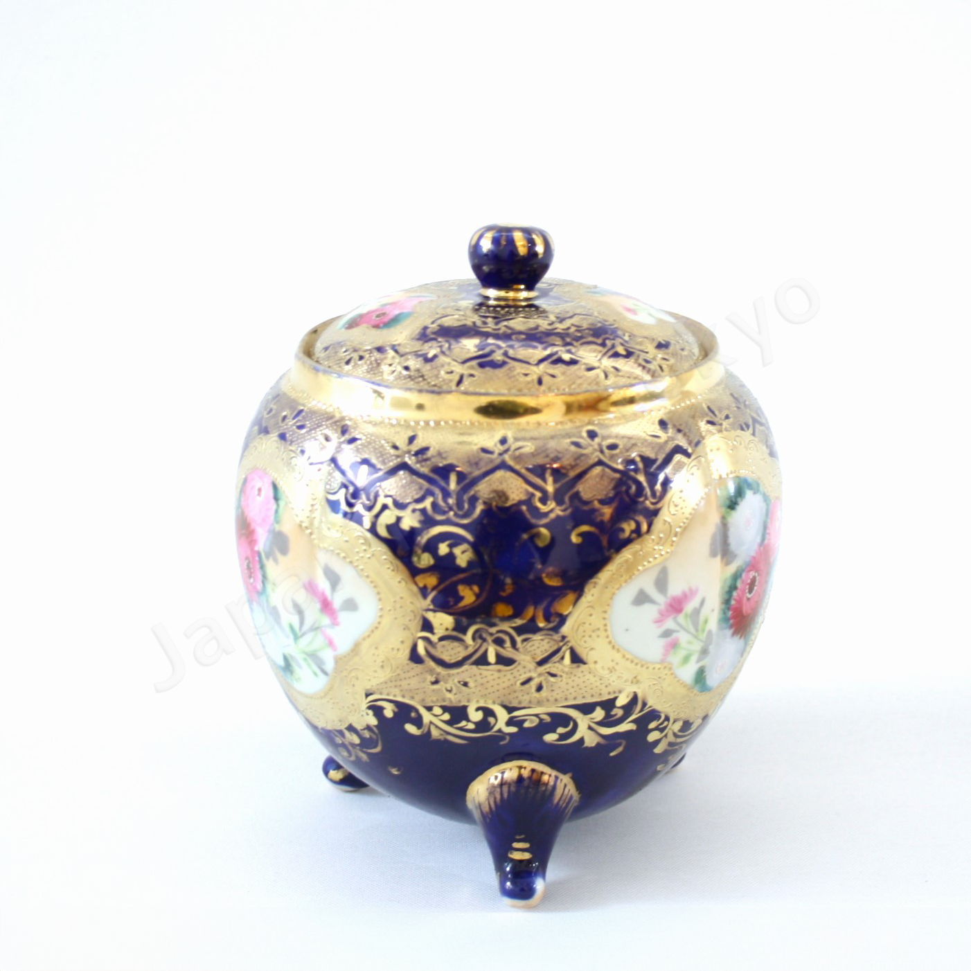 Side view: Japanese old fine china. Old Noritake.
Footed cookie jar with Chrysanthemum design
cobalt blue and gold relief