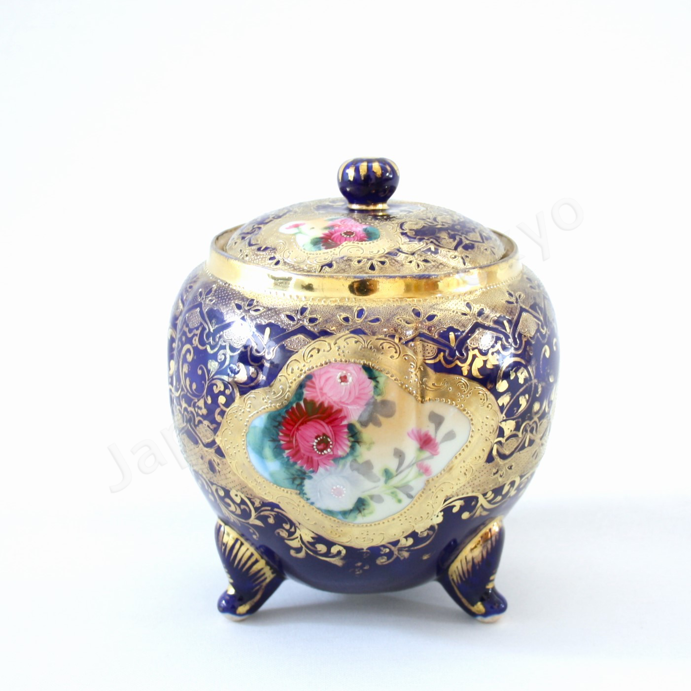 Back view: Japanese old fine china. Old Noritake.
Footed cookie jar with Chrysanthemum design
cobalt blue and gold relief
