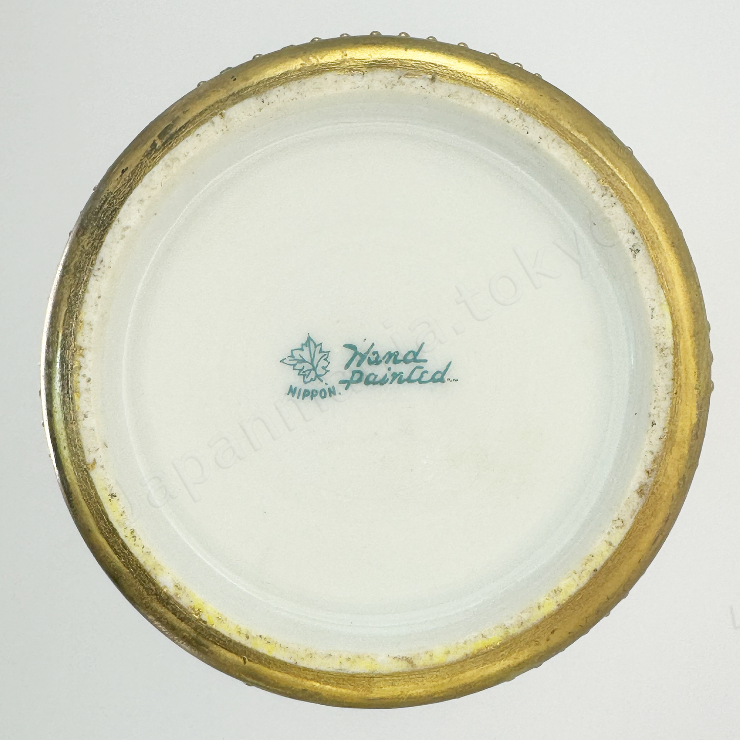 Back stamps: Maple leaf
Japanese old fine china. Old Noritake.
Ruffle top vase
Rose and chandelier design
Polychrome, gold relief, and enamel decoration
