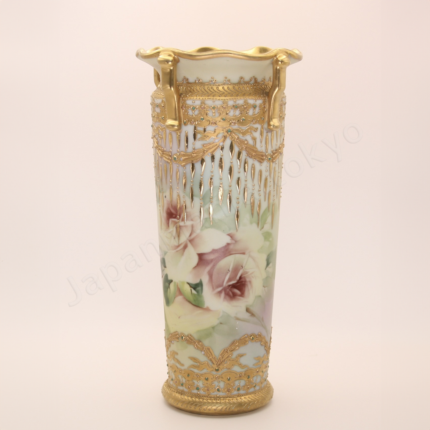 Front view: Japanese old fine china. Old Noritake.
Ruffle top vase
Rose and chandelier design
Polychrome, gold relief, and enamel decoration