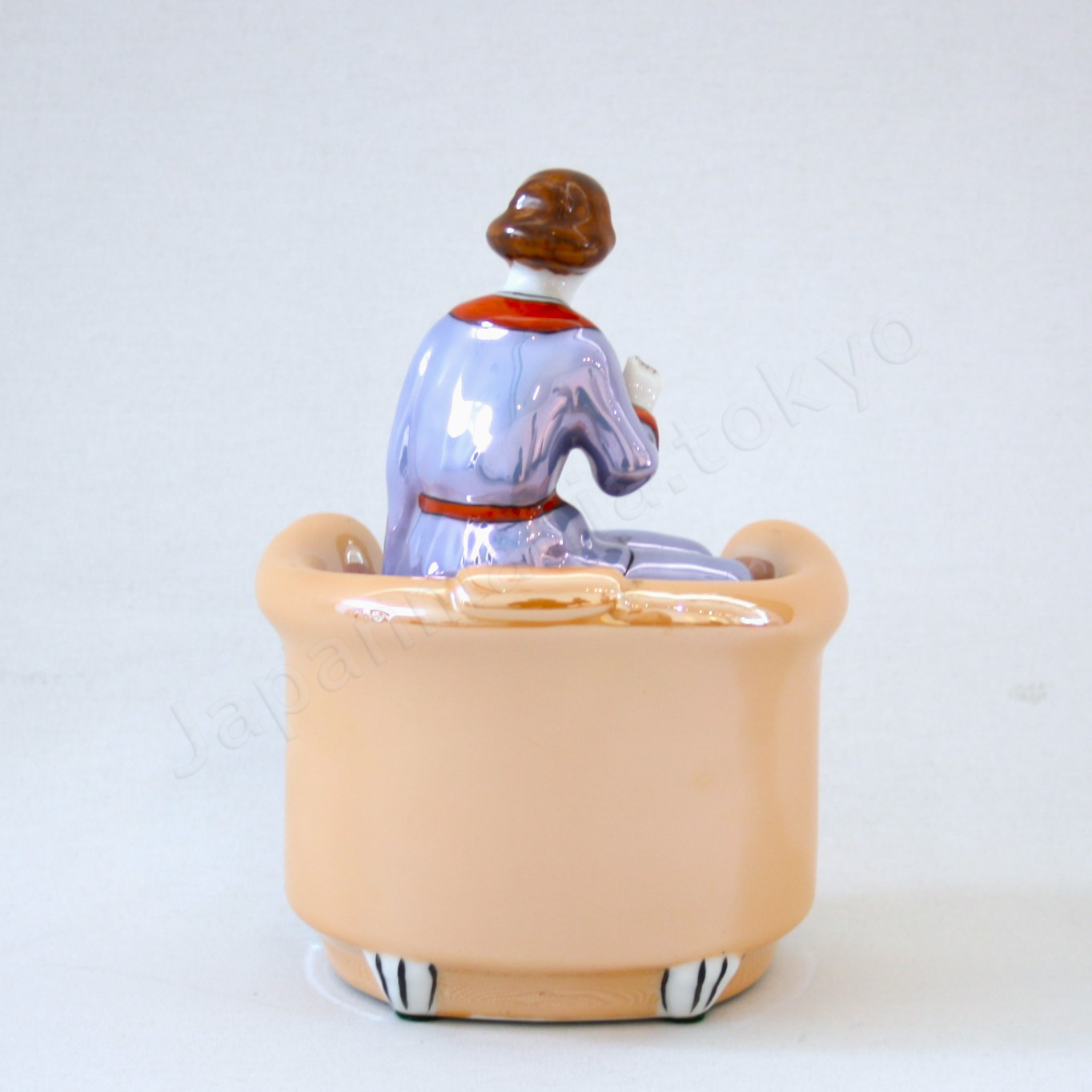 Back view:Japanese old fine china. Old Noritake.
Art Deco style
Container with Lady-shaped lid
Sitting lady design
Polychrome luster
