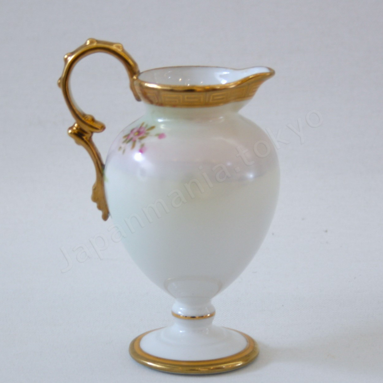 Back view: Japanese Antique fine china. Old Noritake.
Tea set
Swan and landscape design
Polychrome and gold