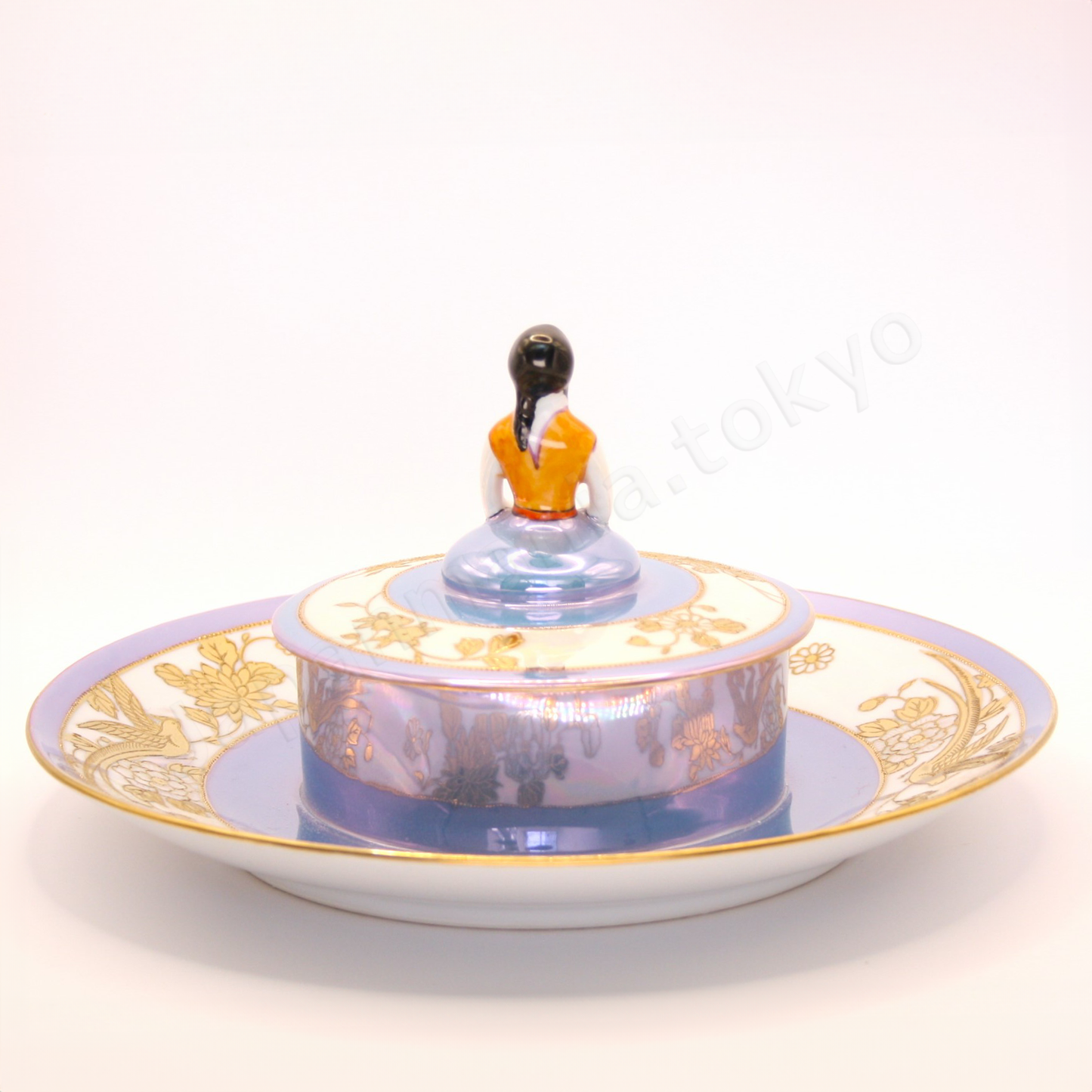 Back view: Japanese antique fine china. Old Noritake, Dip Dish, showcasing its unique Art Deco style and a lady-shaped lid with vibrant floral motifs and a beautiful polychrome luster finish.