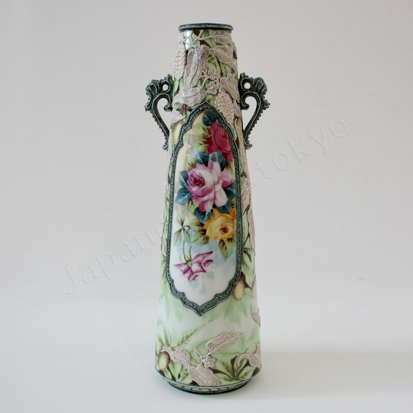 Back view: Japanese antique fine china, Old Noritake.
Vase with handles
Rose and Berry design
polychrome, Moriage decoration