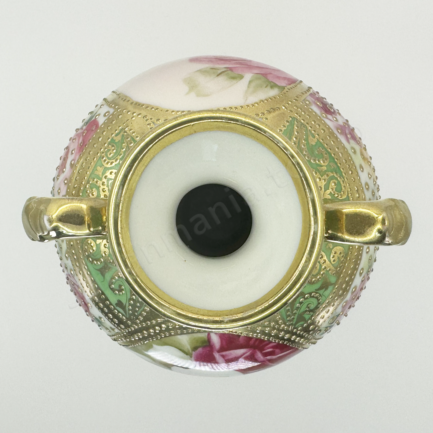 Top view: Japanese antique fine china, Old Noritake.
Decorated pot with handles
Rose design
Polychrome and dotted gold relief