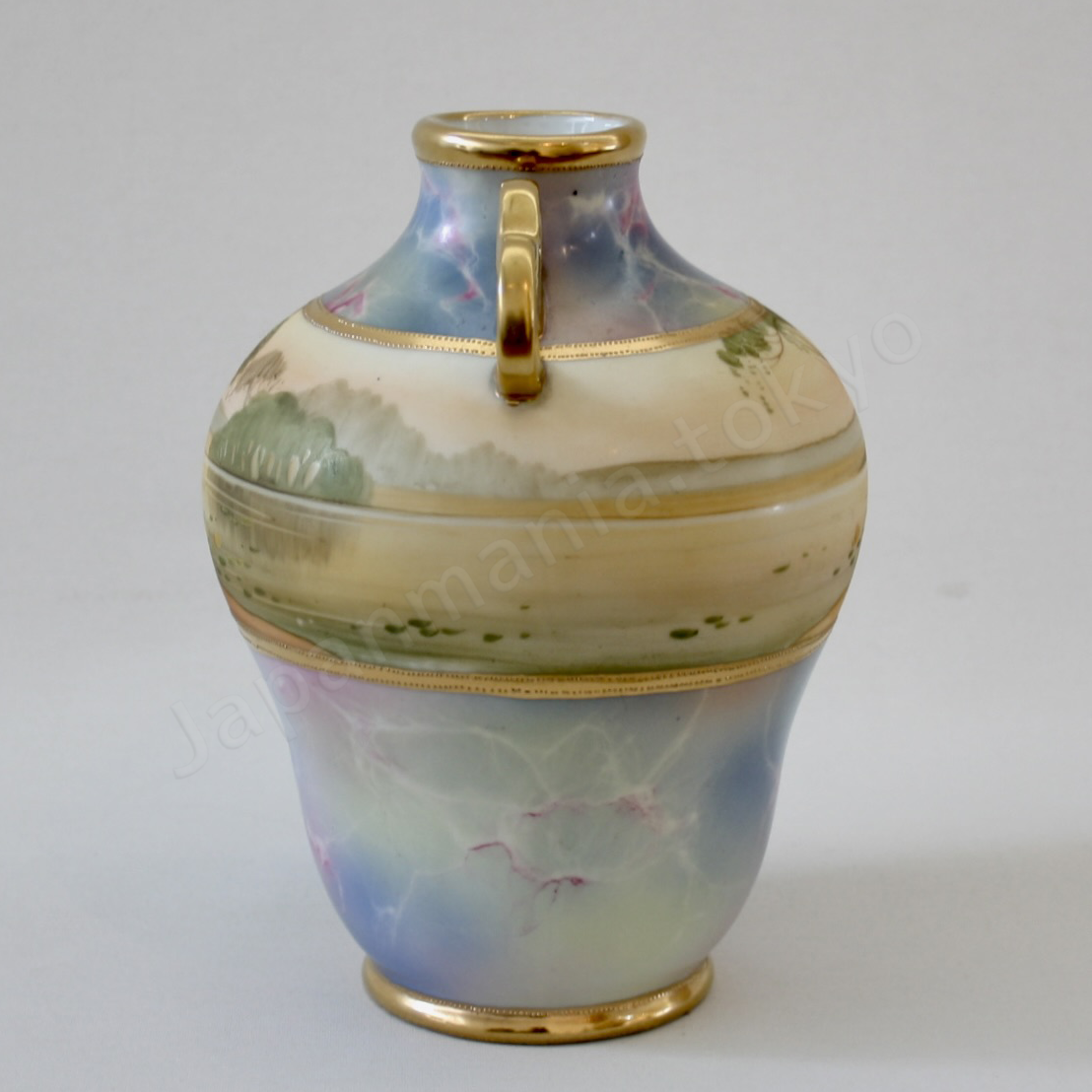 Side view: Japanese antique fine china, Old Noritake.
Vase with handles
Marble landscape design
Polychrome and gold