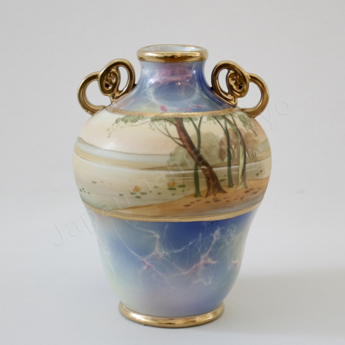 Back view: Japanese antique fine china, Old Noritake.
Vase with handles
Marble landscape design
Polychrome and gold