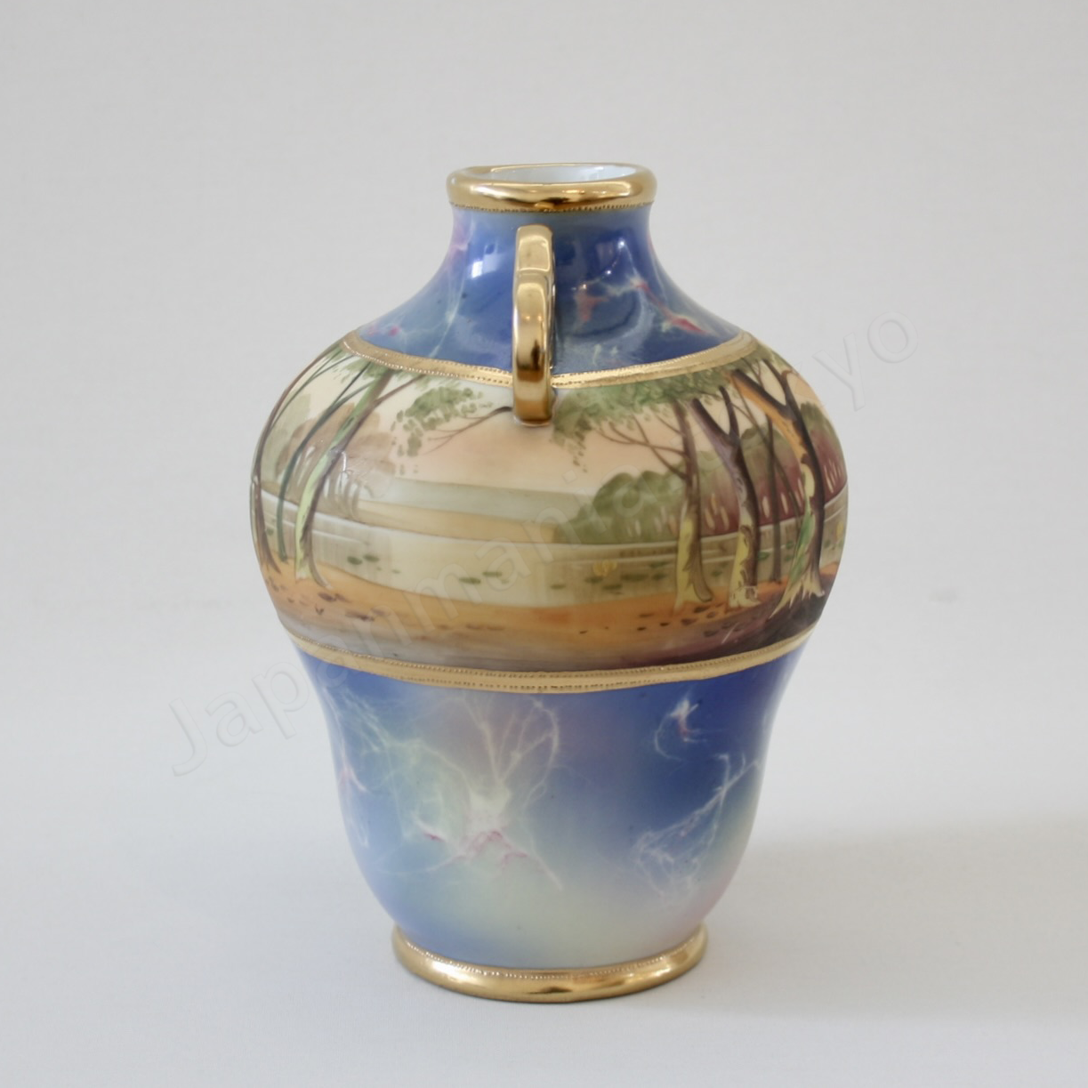 Side view: Japanese antique fine china, Old Noritake.
Vase with handles
Marble landscape design
Polychrome and gold