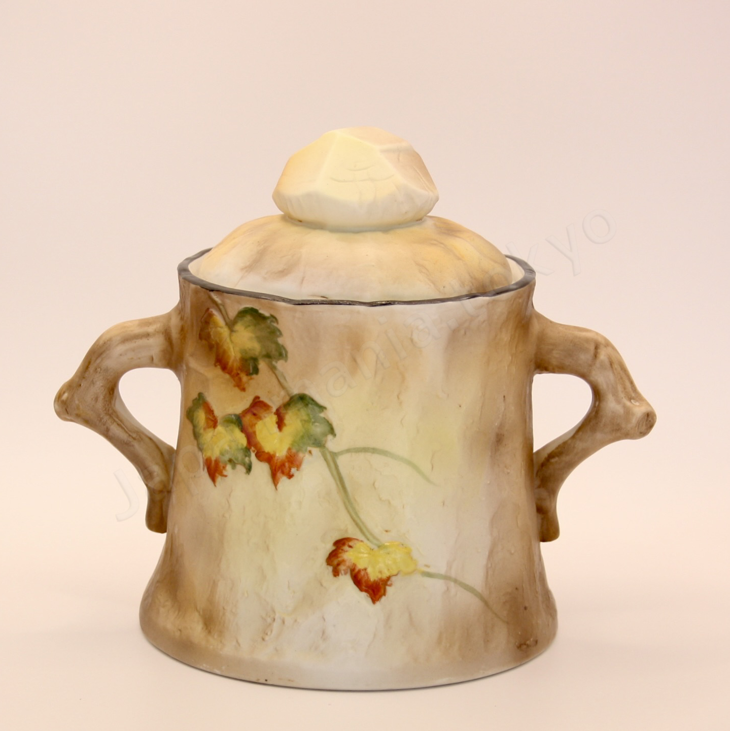 Back view: Japanese antique fine china, Old Noritake.
Humidor with handles
Raccoon design
Molded shape, polychrome